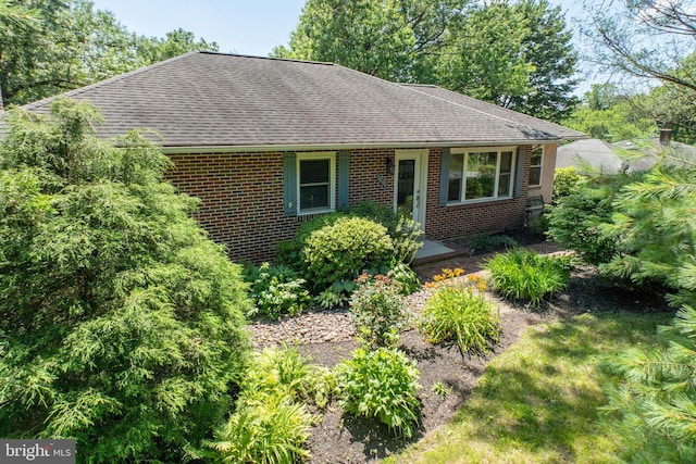 860 Temple Rd, Pottstown, PA 19465 - view of front of property featuring a shingled roof and brick siding