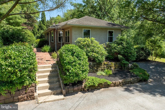 860 Temple Rd, Pottstown, PA 19465 - view of front of home featuring stucco siding and roof with shingles
