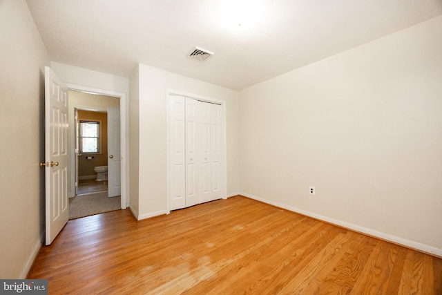 860 Temple Rd, Pottstown, PA 19465 - unfurnished bedroom featuring light wood-style floors and a closet