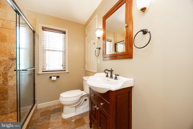 860 Temple Rd, Pottstown, PA 19465 - bathroom with a shower stall, vanity, and stone finish flooring