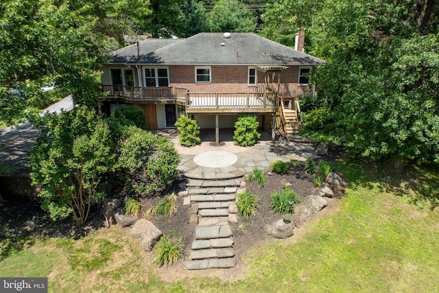 860 Temple Rd, Pottstown, PA 19465 - rear view of house featuring stairway, a patio area, a deck, brick siding, and a chimney