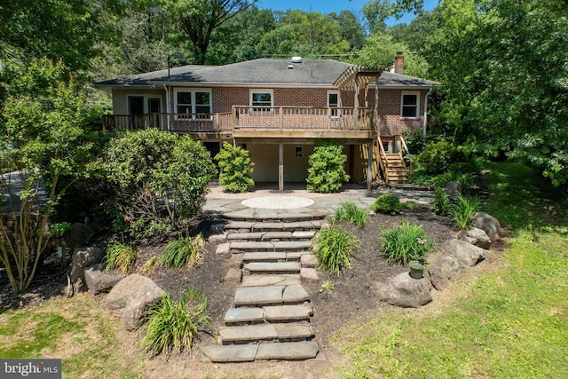 860 Temple Rd, Pottstown, PA 19465 - rear view of house with stairs, a deck, brick siding, and a chimney