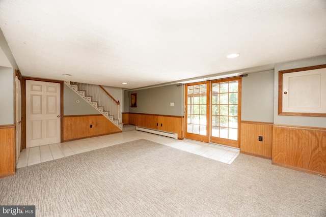 860 Temple Rd, Pottstown, PA 19465 - basement with wainscoting, baseboard heating, wooden walls, stairway, and carpet floors