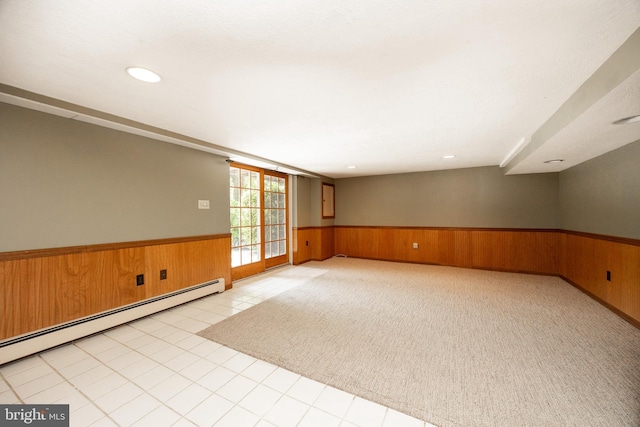 860 Temple Rd, Pottstown, PA 19465 - spare room with a wainscoted wall, baseboard heating, wood walls, and recessed lighting