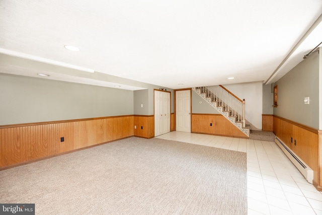 860 Temple Rd, Pottstown, PA 19465 - finished basement featuring a baseboard heating unit, wainscoting, stairs, wood walls, and recessed lighting