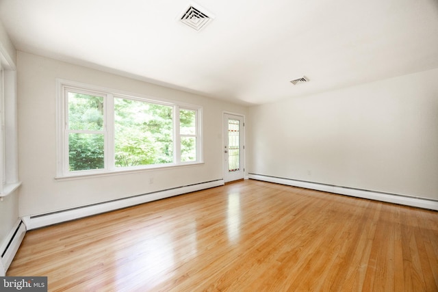 860 Temple Rd, Pottstown, PA 19465 - spare room with a baseboard radiator, a baseboard heating unit, and wood finished floors