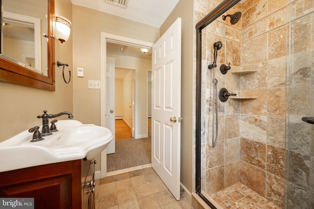860 Temple Rd, Pottstown, PA 19465 - bathroom with a stall shower, vanity, and baseboard heating