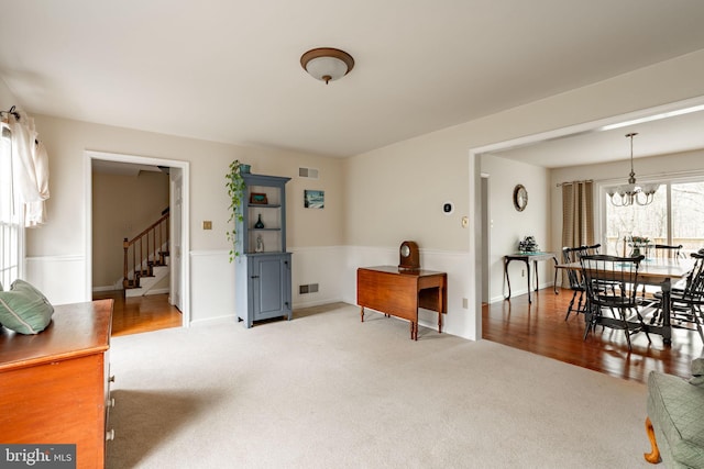 5 Charcoal Ln, Mohnton, PA 19540 - living room with carpet floors, a chandelier, and stairs
