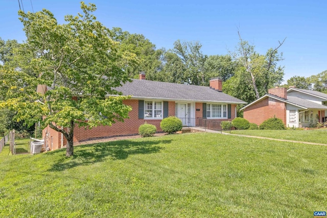 608 Davis Ave, Charlottesville, VA 22901 - ranch-style home featuring a front lawn, brick siding, and a chimney