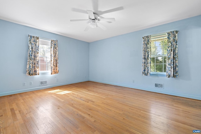 608 Davis Ave, Charlottesville, VA 22901 - empty room with light wood-style floors and a ceiling fan