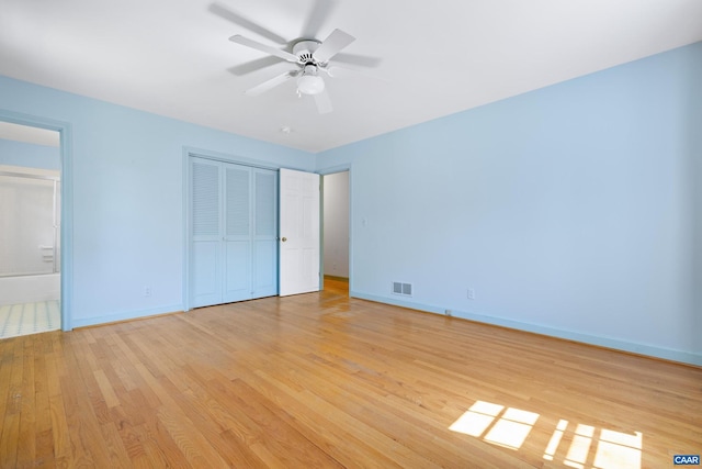 608 Davis Ave, Charlottesville, VA 22901 - unfurnished bedroom with light wood-style floors, ensuite bath, a closet, and ceiling fan