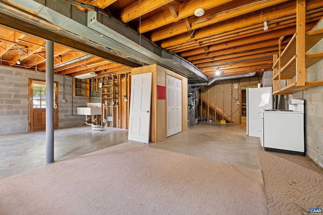 608 Davis Ave, Charlottesville, VA 22901 - basement featuring washer / clothes dryer and freestanding refrigerator