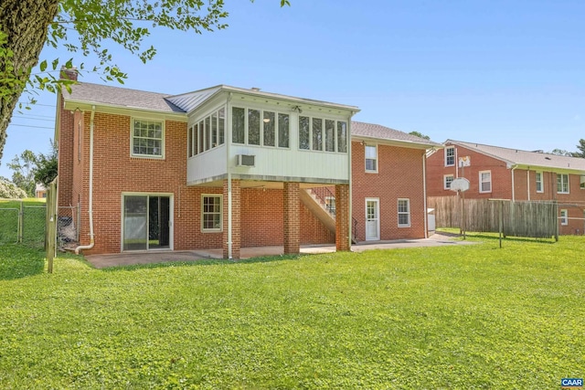 608 Davis Ave, Charlottesville, VA 22901 - rear view of house featuring a chimney, a sunroom, a patio, and brick siding