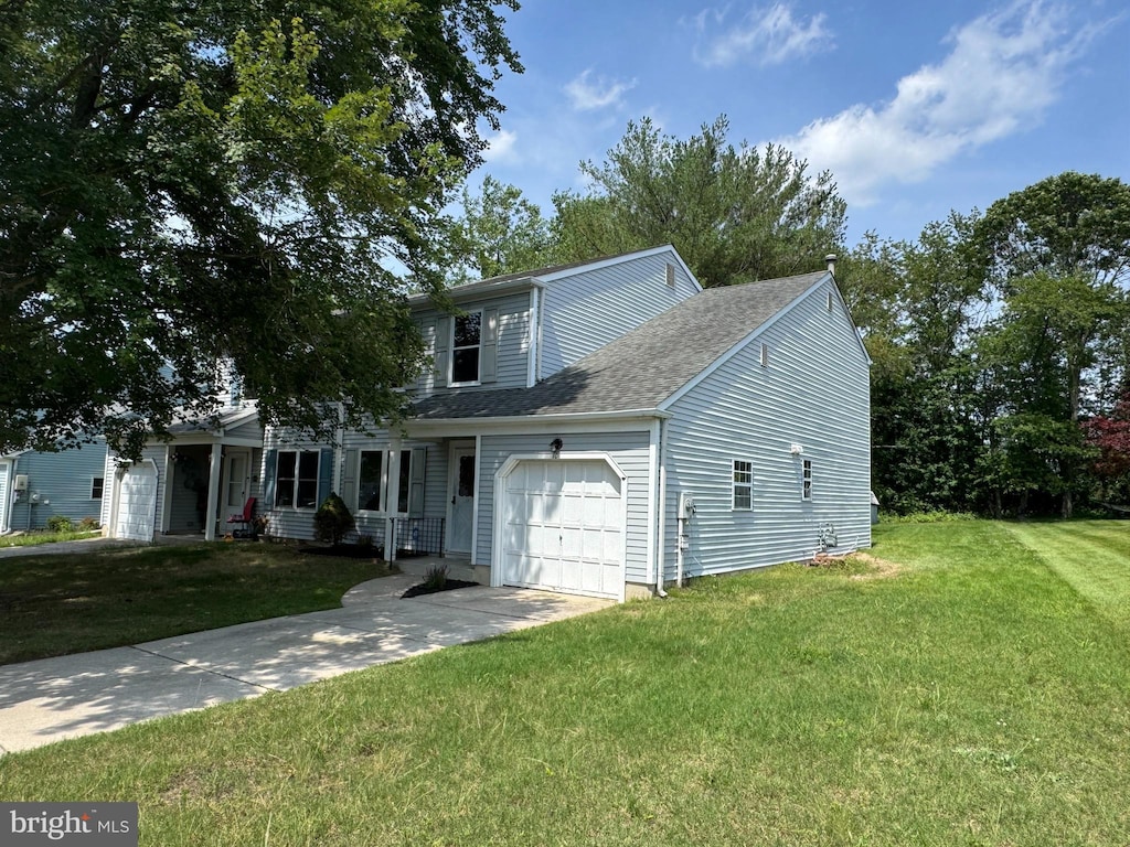 10 Woodmill Dr, Clementon, NJ 08021 - traditional-style home with a garage, driveway, a front lawn, and a shingled roof