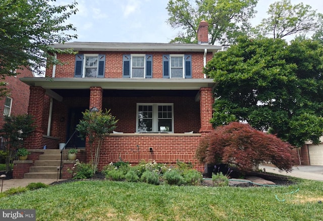 301 Fleming Ave, Frederick, MD 21701 - view of front of home with brick siding, a porch, and a chimney