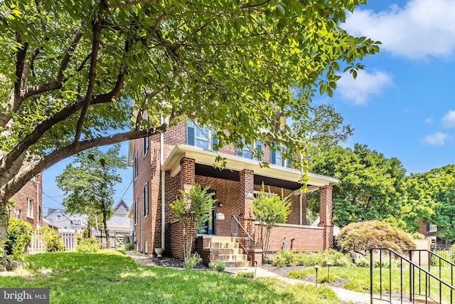 301 Fleming Ave, Frederick, MD 21701 - view of front of home with brick siding and covered porch