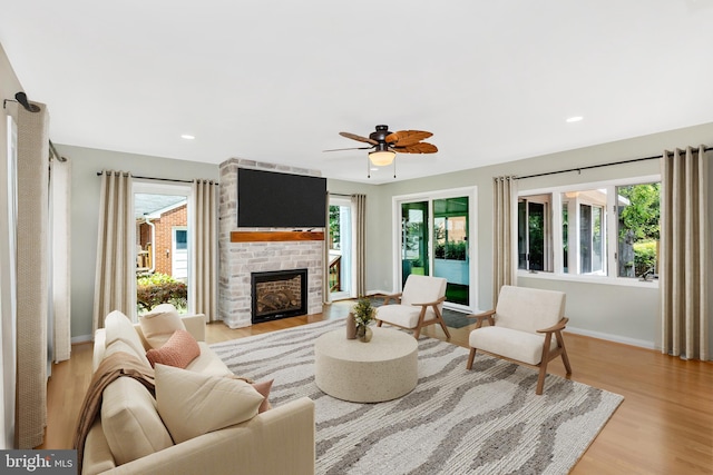 301 Fleming Ave, Frederick, MD 21701 - living room featuring healthy amount of natural light, light wood-type flooring, a ceiling fan, and recessed lighting