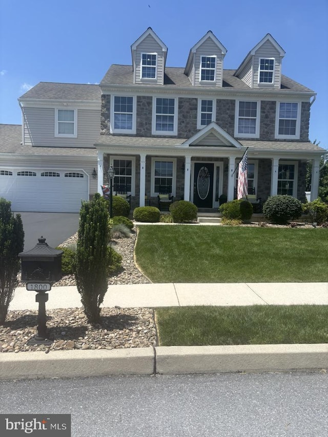1800 Boxwood Cv, Palmyra, PA 17078 - view of front of property featuring a front lawn and an attached garage