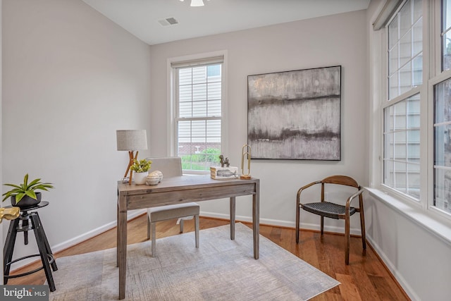 44357 Oakmont Manor Sq, Ashburn, VA 20147 - office area featuring wood finished floors and plenty of natural light