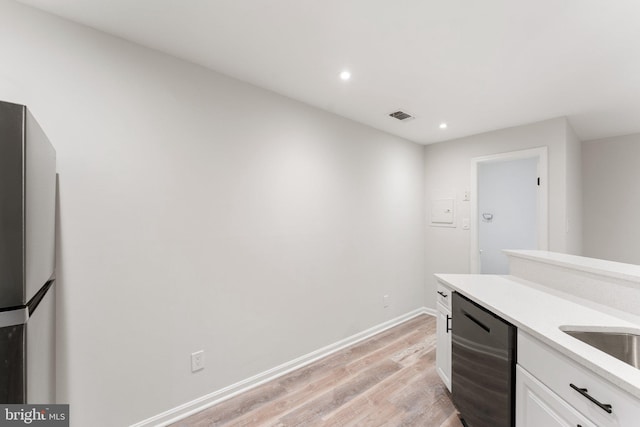 12560 Kempston Ln, Woodbridge, VA 22192 - bar with dishwashing machine, light wood-style floors, recessed lighting, and freestanding refrigerator