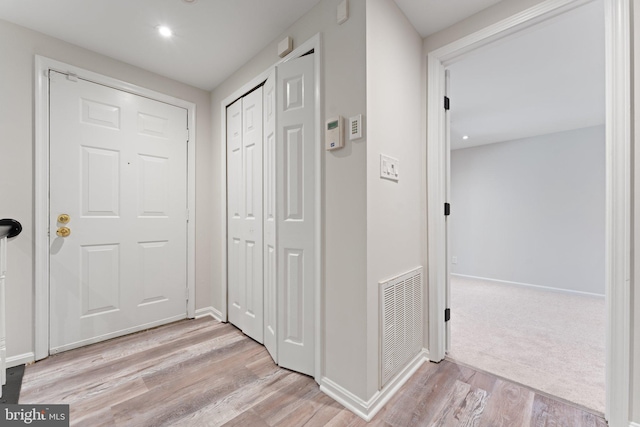 12560 Kempston Ln, Woodbridge, VA 22192 - hallway featuring light wood-style flooring and recessed lighting