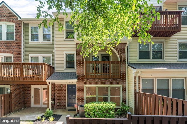 12560 Kempston Ln, Woodbridge, VA 22192 - view of front of home with a balcony and french doors