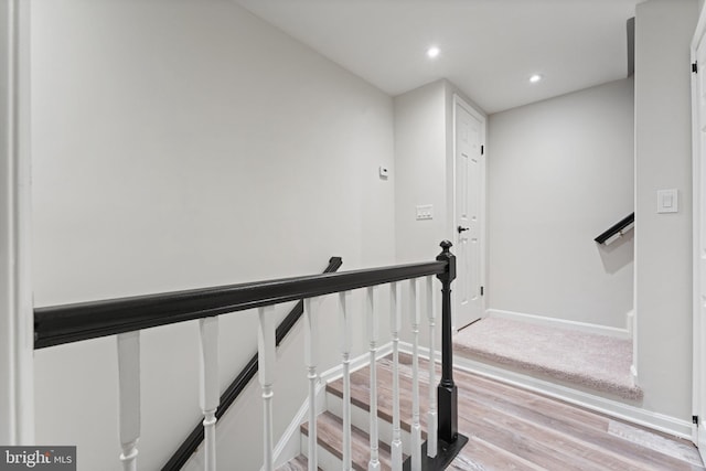 12560 Kempston Ln, Woodbridge, VA 22192 - staircase featuring wood finished floors and recessed lighting