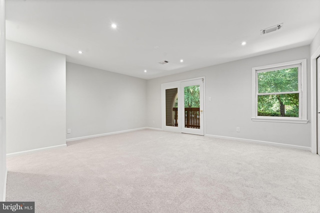 12560 Kempston Ln, Woodbridge, VA 22192 - empty room with healthy amount of natural light, recessed lighting, and light colored carpet