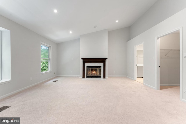 12560 Kempston Ln, Woodbridge, VA 22192 - unfurnished living room featuring light colored carpet, a premium fireplace, and recessed lighting