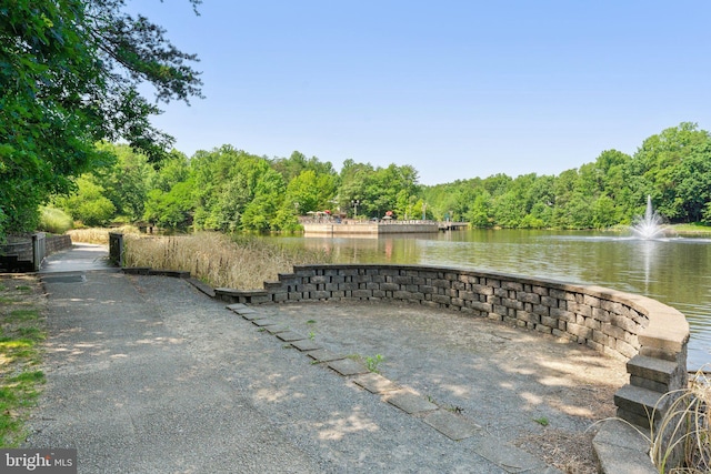 12560 Kempston Ln, Woodbridge, VA 22192 - view of patio with a water view and a wooded view