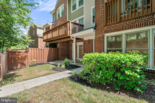 12560 Kempston Ln, Woodbridge, VA 22192 - entrance to property featuring a balcony and brick siding