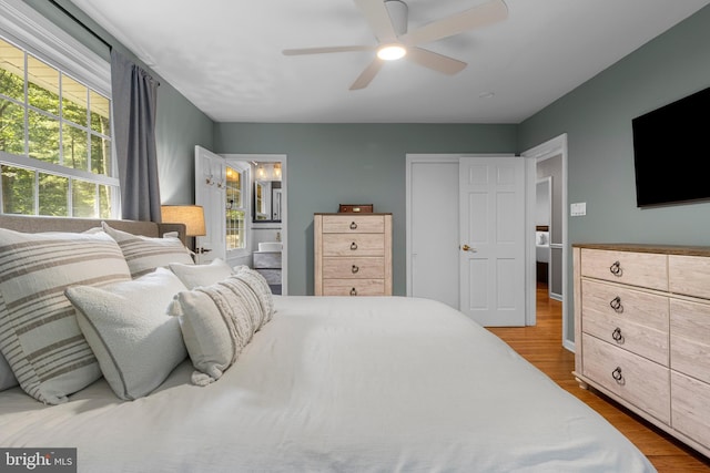13 Weirwood Rd, Wayne, PA 19087 - bedroom with wood finished floors, ceiling fan, and ensuite bath