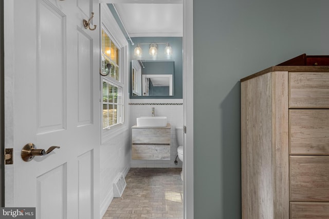 13 Weirwood Rd, Wayne, PA 19087 - bathroom featuring vanity and tile walls