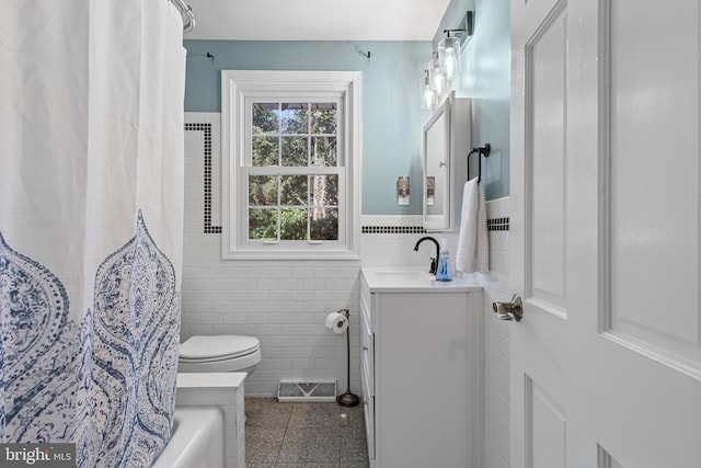 13 Weirwood Rd, Wayne, PA 19087 - bathroom with tile walls, vanity, and wainscoting