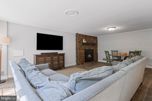 13 Weirwood Rd, Wayne, PA 19087 - living area with wood finished floors and a stone fireplace