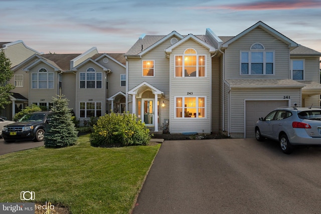 243 Prince William Way, Chalfont, PA 18914 - multi unit property featuring asphalt driveway, an attached garage, and a yard