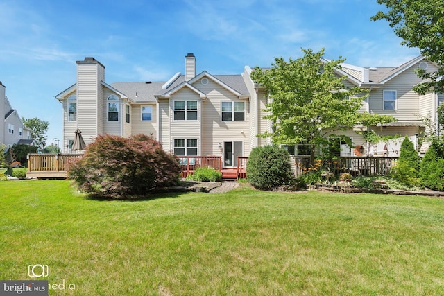 243 Prince William Way, Chalfont, PA 18914 - back of house featuring a deck, a yard, and a chimney
