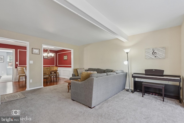 243 Prince William Way, Chalfont, PA 18914 - living area with carpet flooring, a chandelier, and beamed ceiling