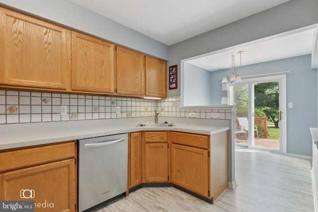 243 Prince William Way, Chalfont, PA 18914 - kitchen featuring stainless steel dishwasher, light countertops, backsplash, and light wood-style flooring