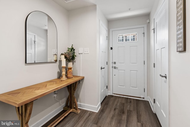 28 Boot Ln, Gilbertsville, PA 19525 - foyer entrance featuring dark wood-style floors and arched walkways