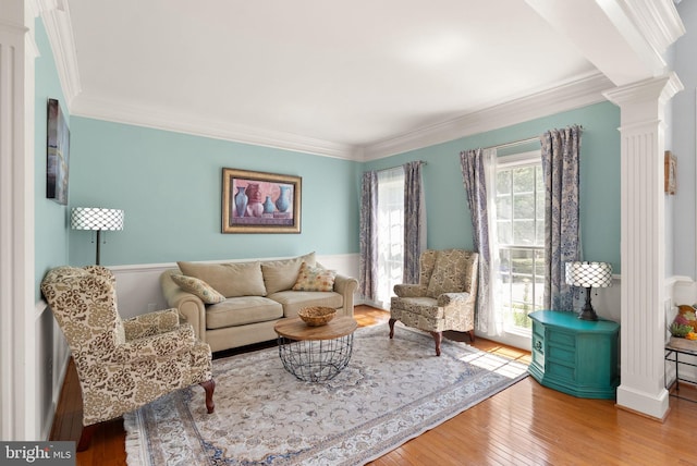 14512 Penderlea Ct, Gainesville, VA 20155 - living area with ornate columns, crown molding, and wood finished floors