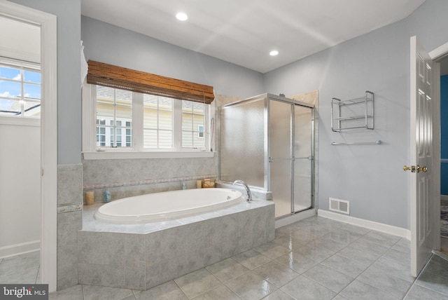14512 Penderlea Ct, Gainesville, VA 20155 - bathroom with a bath, a stall shower, tile patterned flooring, and recessed lighting