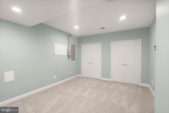 14512 Penderlea Ct, Gainesville, VA 20155 - unfurnished bedroom with multiple closets, light carpet, recessed lighting, and electric panel