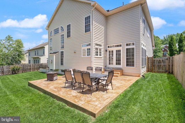 14512 Penderlea Ct, Gainesville, VA 20155 - rear view of house featuring a patio area, a fenced backyard, and an outdoor fire pit
