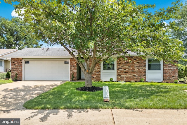 321 Persica Plz, Monroe Township, NJ 08831 - obstructed view of property with a garage, brick siding, concrete driveway, a front lawn, and a shingled roof