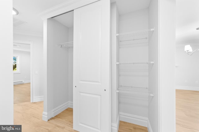 321 Persica Plz, Monroe Township, NJ 08831 - closet featuring a baseboard heating unit