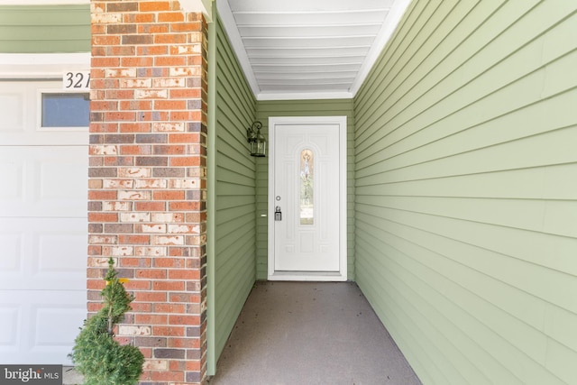 321 Persica Plz, Monroe Township, NJ 08831 - property entrance featuring a garage and brick siding