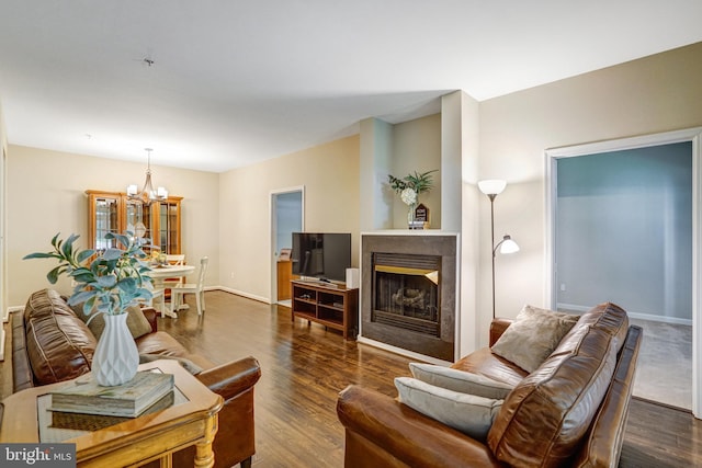 6532 Grange Ln Unit 103, Alexandria, VA 22315 - living area featuring a chandelier, dark wood-style floors, and a fireplace