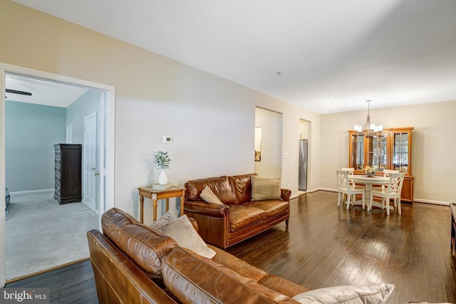 6532 Grange Ln Unit 103, Alexandria, VA 22315 - living area with a chandelier and dark wood-style floors