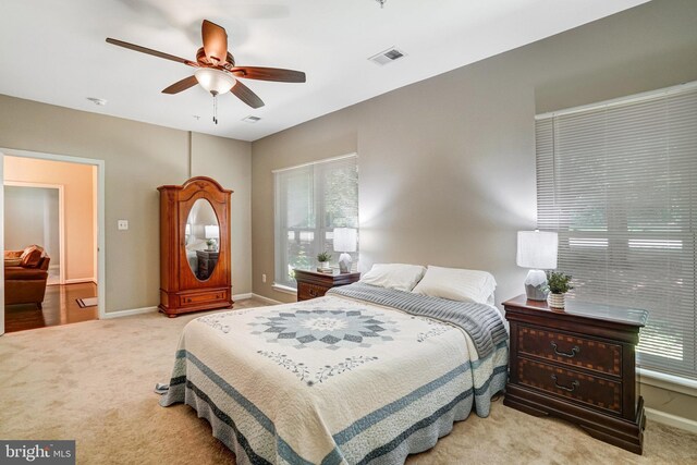6532 Grange Ln Unit 103, Alexandria, VA 22315 - bedroom featuring light colored carpet and ceiling fan